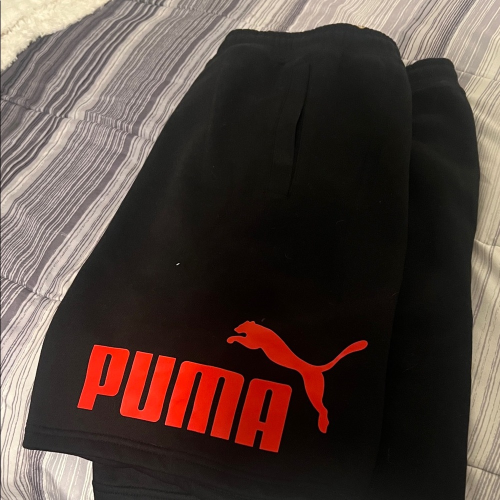 Puma Black Shorts with Vibrant Red Logo